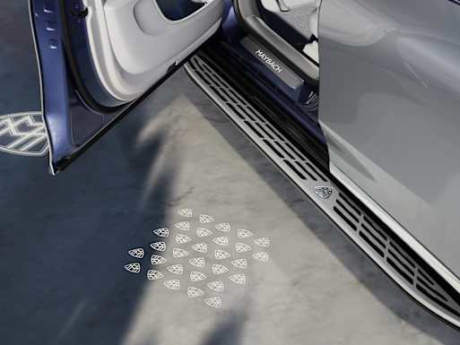 Illuminated running boards and logo projection